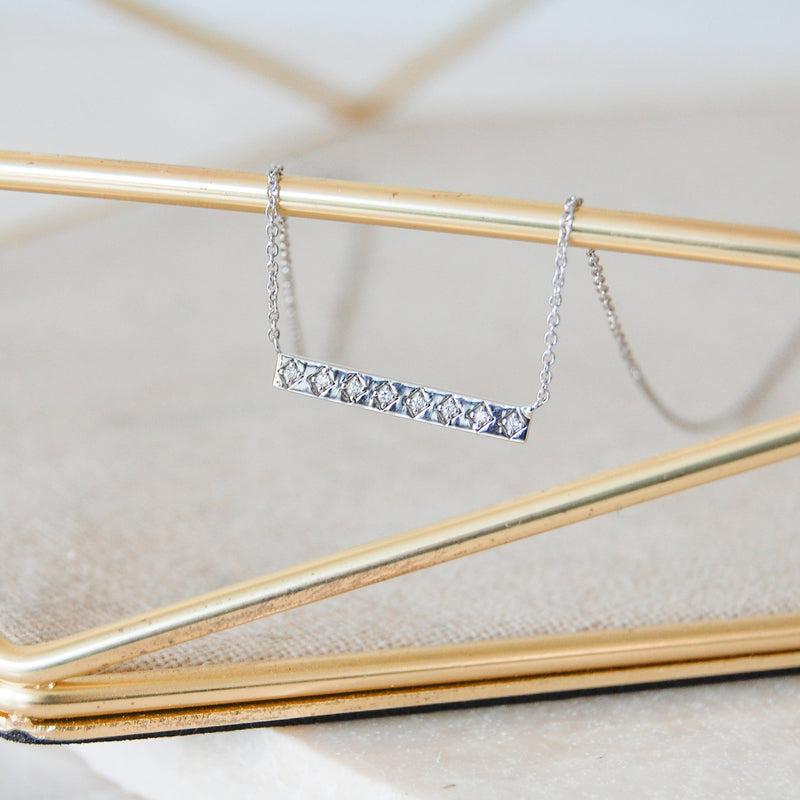 Diamond Bar Bracelet 9k White Gold hanging from jewellery tray bar 