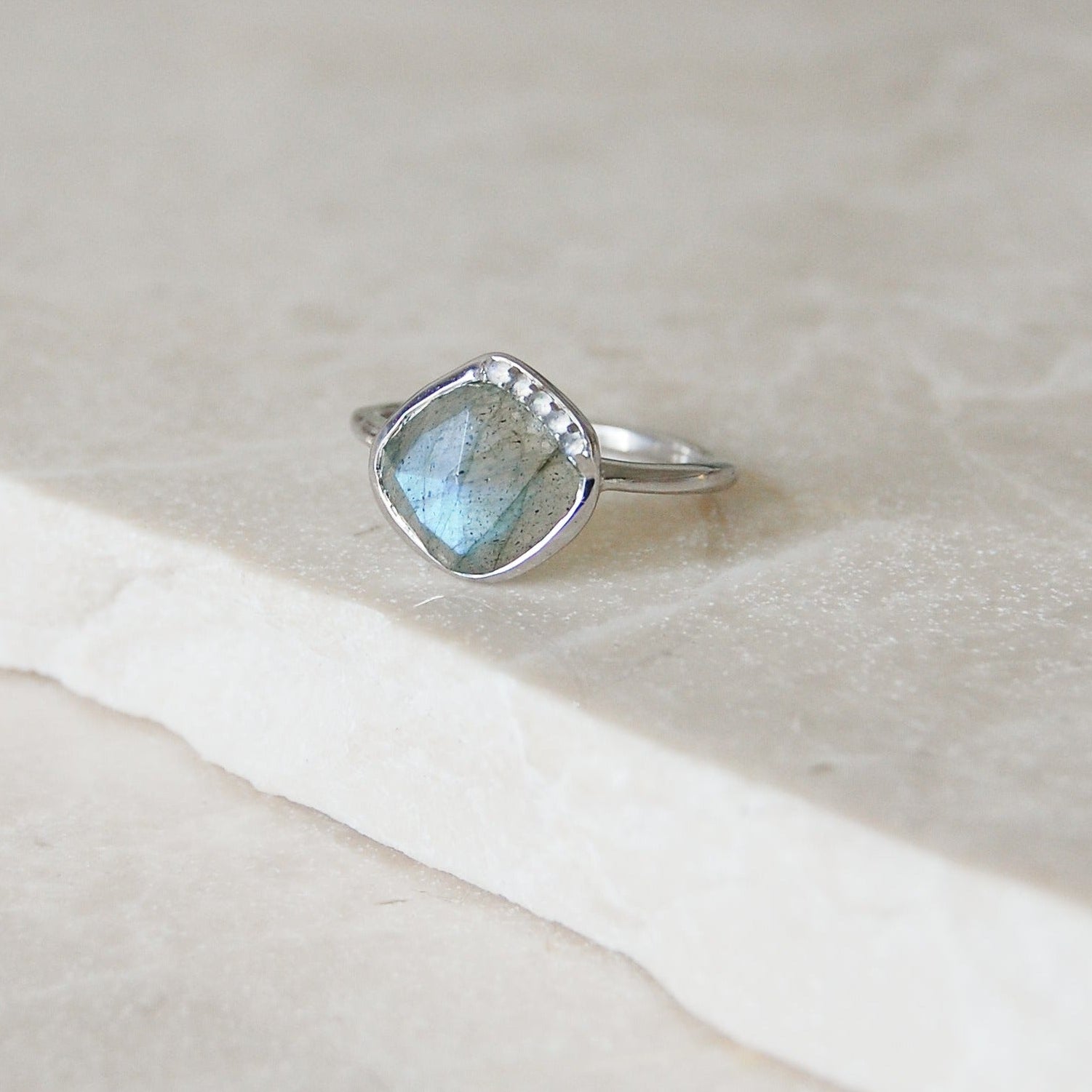 Grecian Labradorite Stone Ring Sterling Silver on marble surface