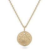 mermaid coin necklace on white background
