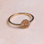 Diamond Octagon Ring 9k Gold on hard surface