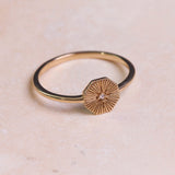 Diamond Octagon Ring 9k Gold on hard surface