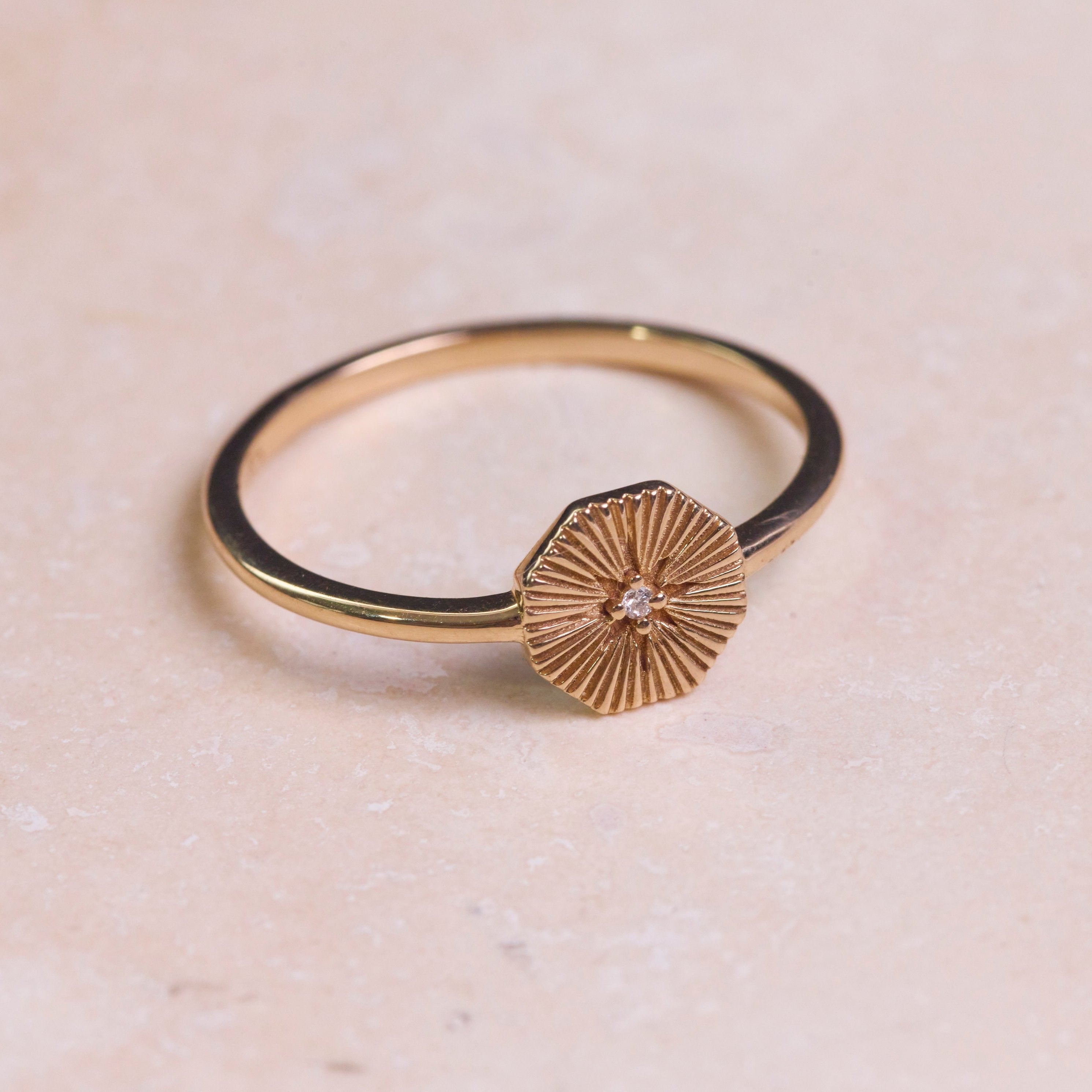 Diamond Octagon Ring 9k Gold on hard surface
