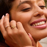 model wearing solid gold rings including the Diamond Octagon Ring 9k Gold