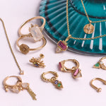 solid gold jewellery pieces displayed including the Diamond Octagon Ring 9k Gold