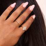 model hand showing solid gold and diamond rings including the Diamond Pavé Ring 9k Gold