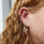 beautiful ear stack with diamond earrings including the Diamond Rhombus Hoop Earrings 9k White Gold