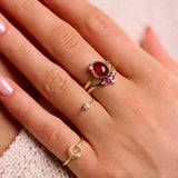 model wearing solid gold rings including the Diamond Solitaire Chain Ring 9k Gold

