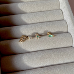 close up of new solid gold flat back earrings including the Emerald Marquise Beaded Flat Back Earring 9k Gold

