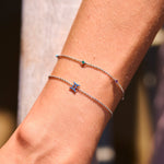 model wearing sterling silver bracelets including the Gem Stone Station Bracelet Sterling Silver
