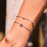 model wearing sterling silver bracelets including the Gem Stone Station Bracelet Sterling Silver
