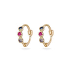 Gold hoop earrings with gemstones on a white background