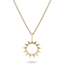Solid gold sunburst pendant