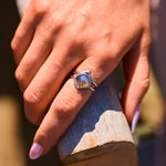 model hand wearing silver stack rings including the Grecian Labradorite Stone Ring Sterling Silver
