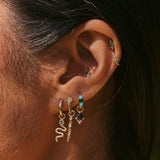 solid gold ear stack including the Green Tourmaline & Turquoise Huggie Hoop Earring 9k Gold