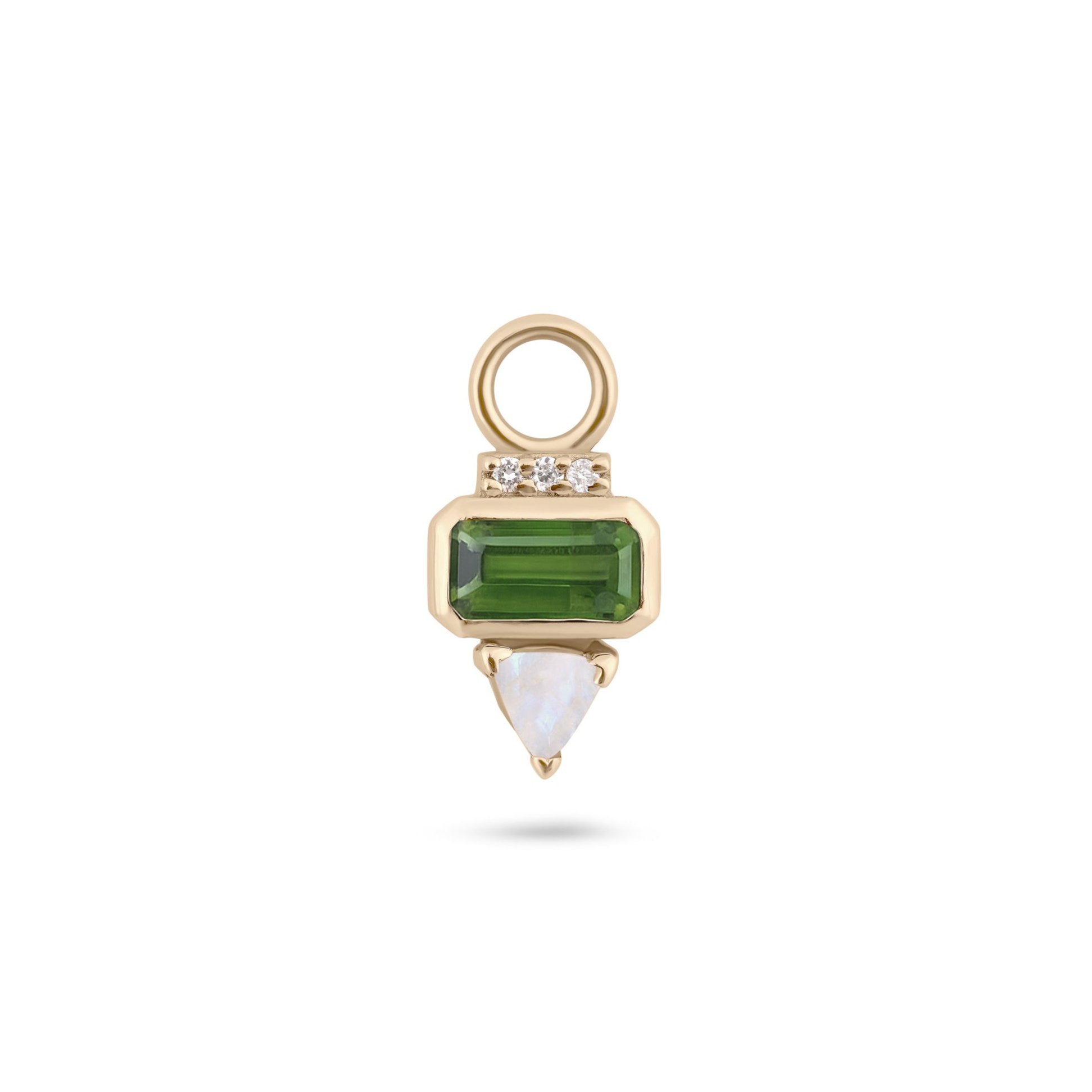 Gold earring charm with green gemstone and white stone on a white background
