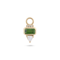 Gold earring charm with green gemstone and white stone on a white background