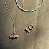 Guava Quartz T-Bar Pendant 9k Gold displayed with matching hoop earring and beaded necklace