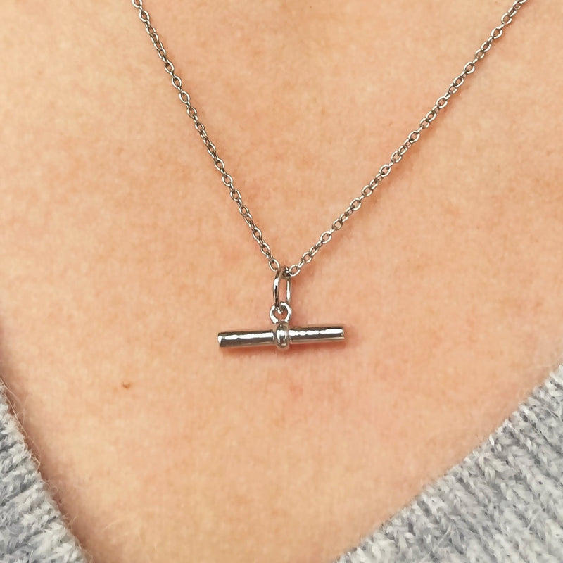 silver t-bar necklace on model