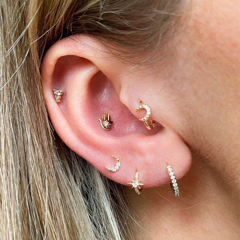 model ear stack with Diamond Moon Flat Back Earring 9k Gold on the upper lobe
