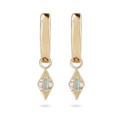 Gold earrings with diamond-shaped pendants on a white background