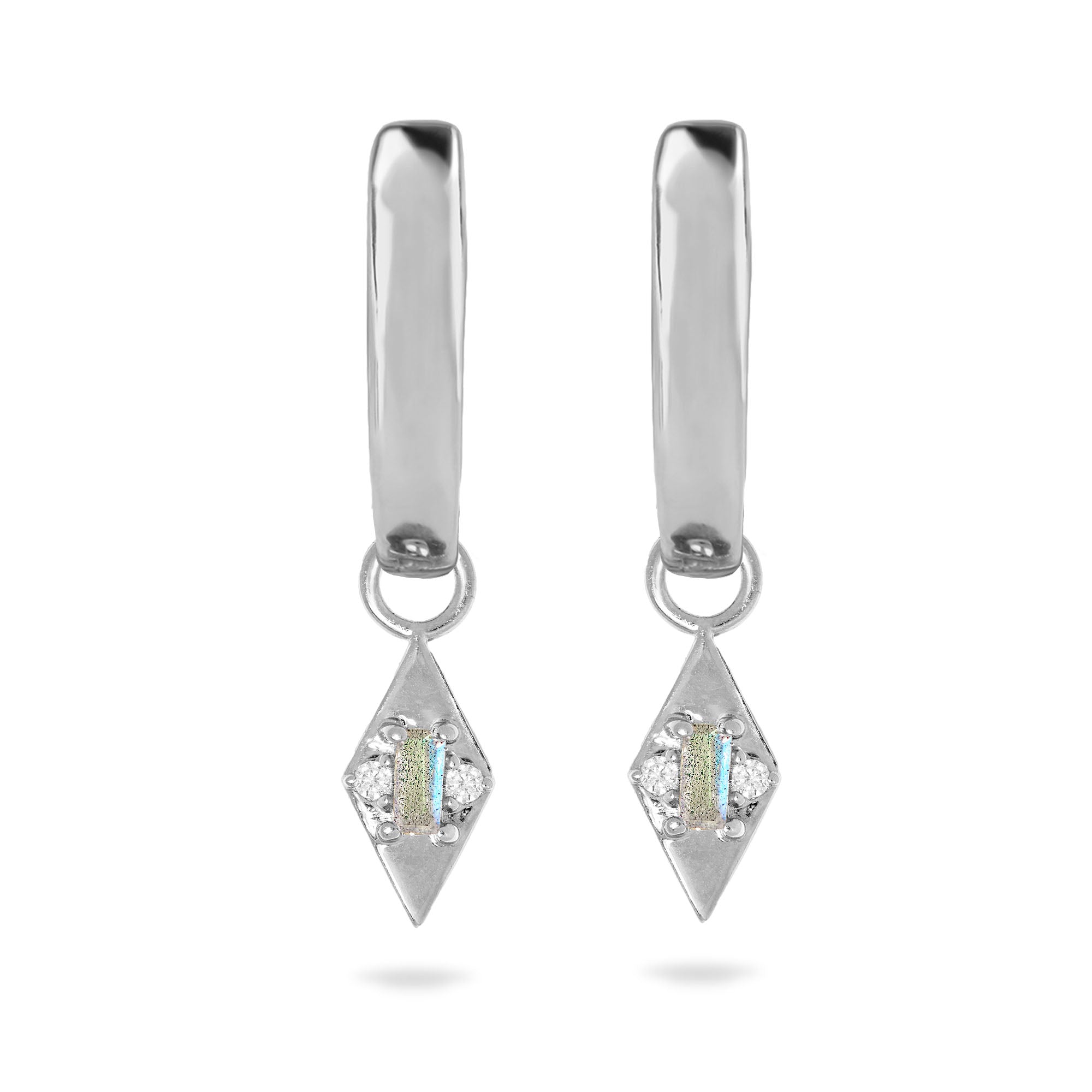 Pair of silver earrings with diamond-shaped pendants on a white background