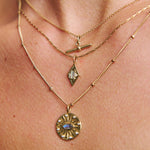 gold necklaces on skin