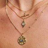 gold necklaces on skin