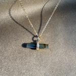 Labradorite T-Bar Necklace 9k Gold displayed on soft faric