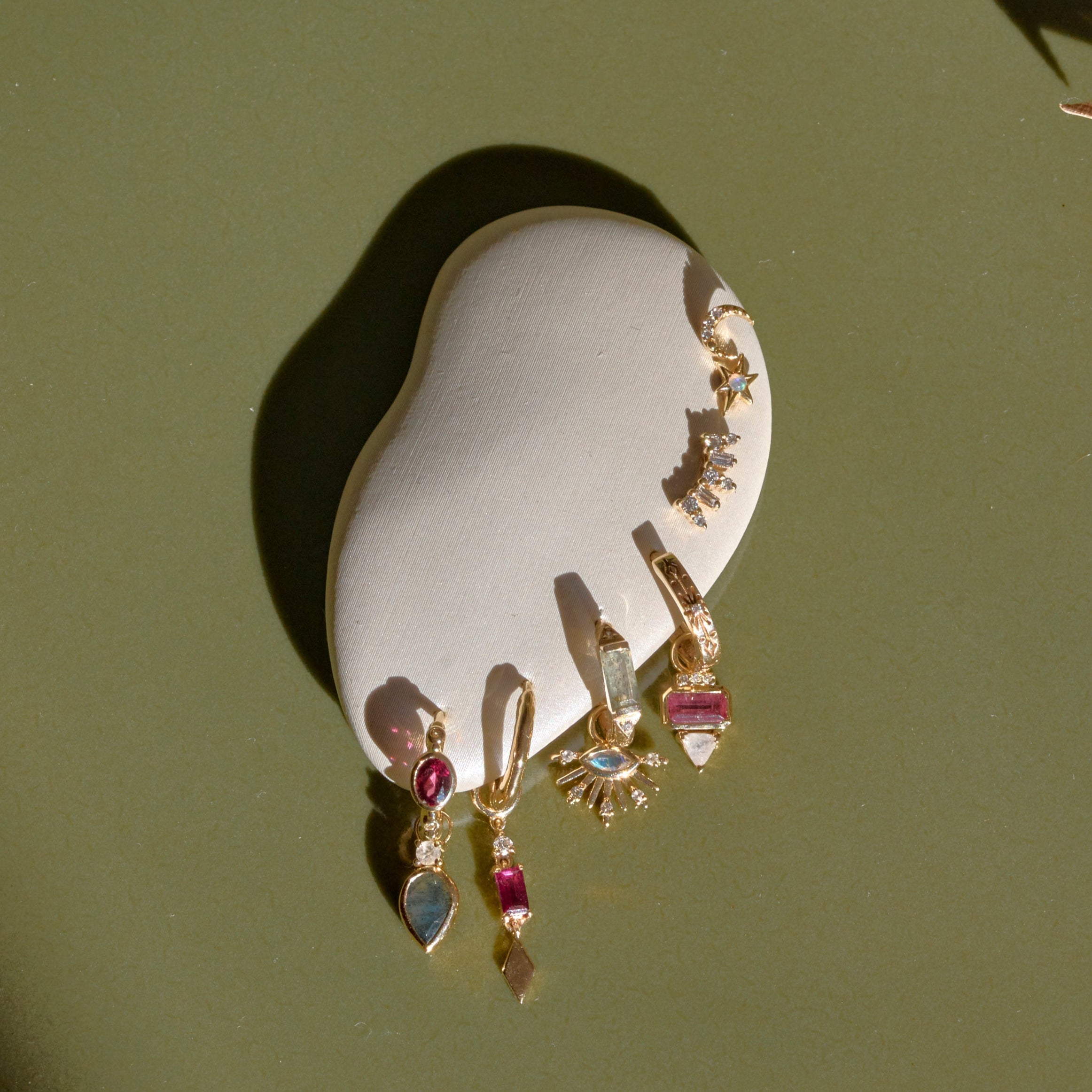 gold earring on ear