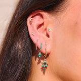 close up of ear stack in solid gold including the Limited Edition Malachite Eye Earring Charm 9k Gold