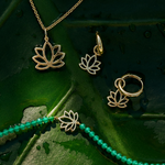 Lotus Flower Earring Charm 9k Gold displayed with the matching pendant, bracelet and hoops