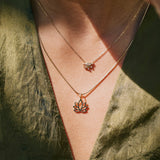 model wearing the Lotus Flower Pendant 9k Gold and the moonstone fan necklace