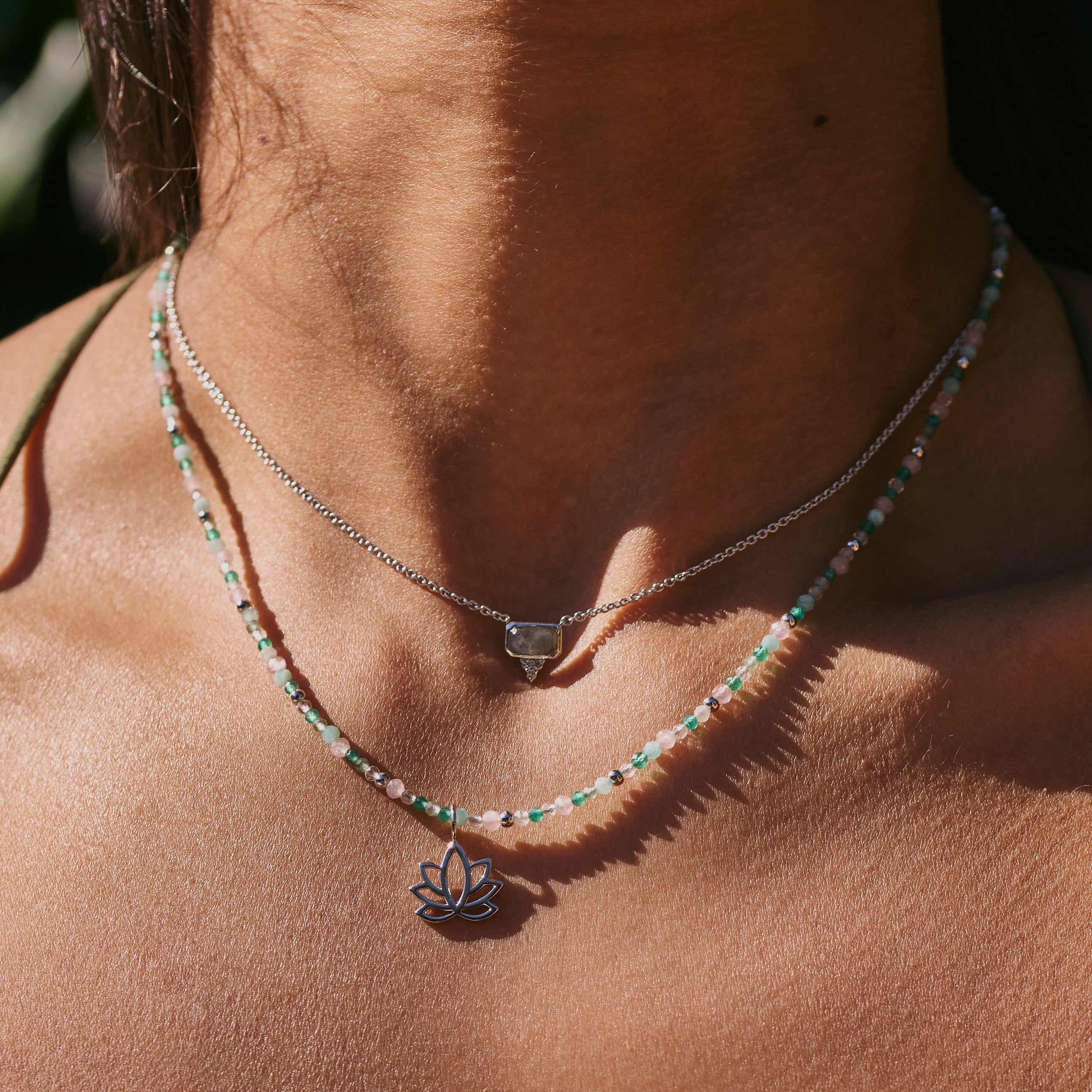 model wearing the Lotus Flower Pendant Sterling Silver with the beaded necklace