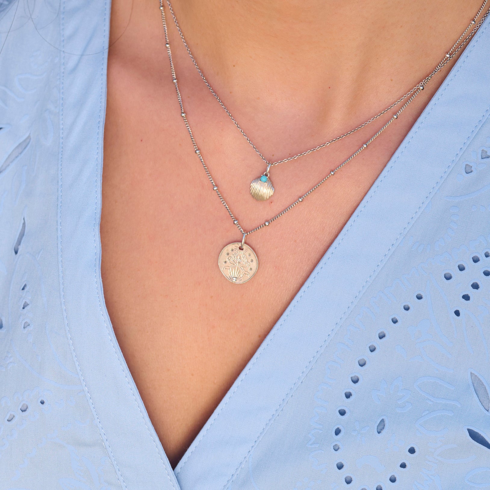 summer silver pendants on model