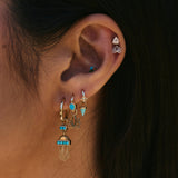 ear stack featuring solid gold jewellery including the Moonstone Trillion & Diamond Flat Back Earring 9k Gold
