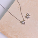 Moonstone & White Sapphire Sunburst Necklace Sterling Silver along with the earring charm