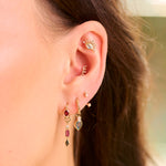 solid gold ear stack including the Moonstone & White Sapphire Sunburst Flat Back Earring 9k Gold