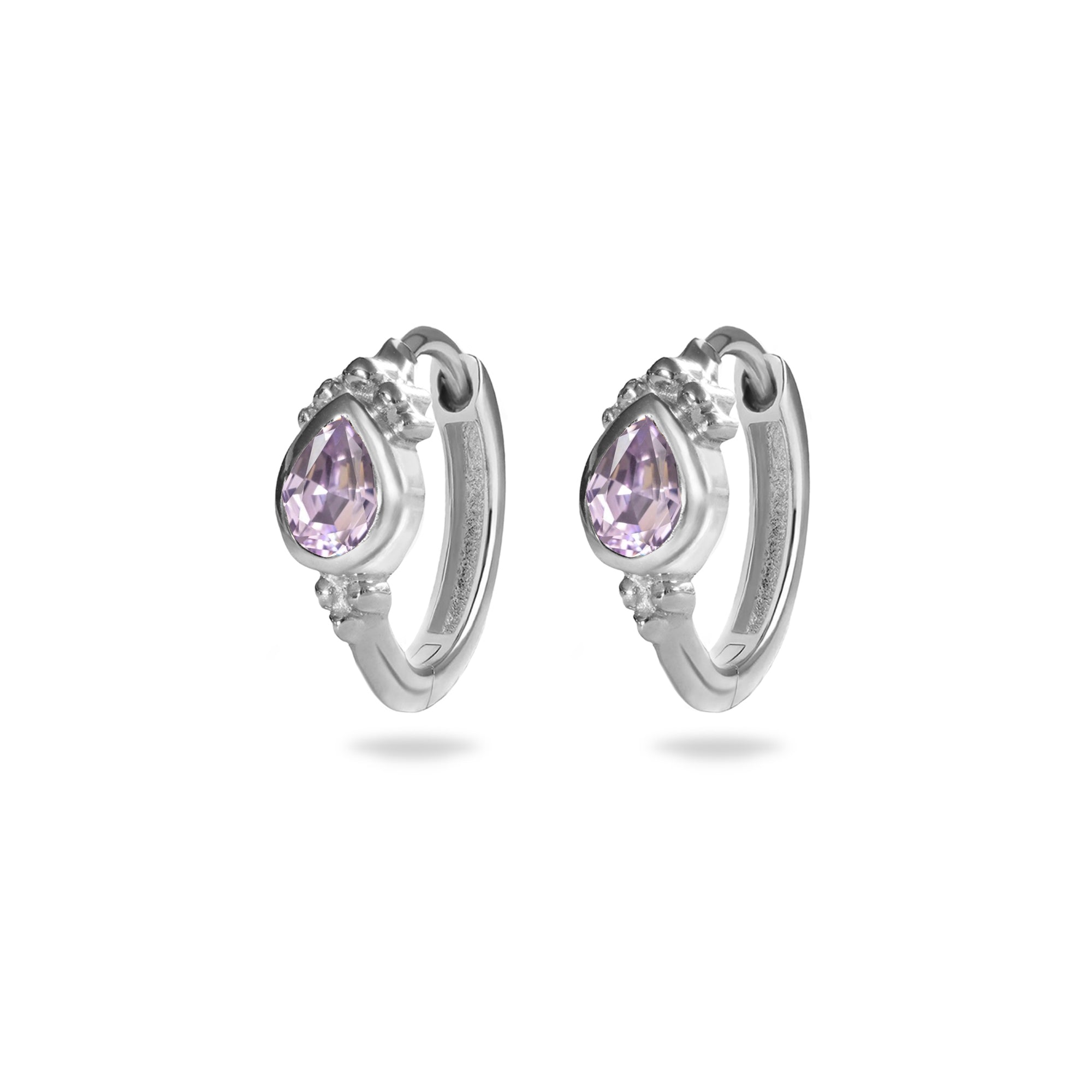 Silver hoop earrings with purple gemstones on a white background