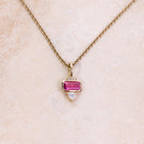 Pink Tourmaline, Diamond & Moonstone Necklace 9k Gold on hard surface
