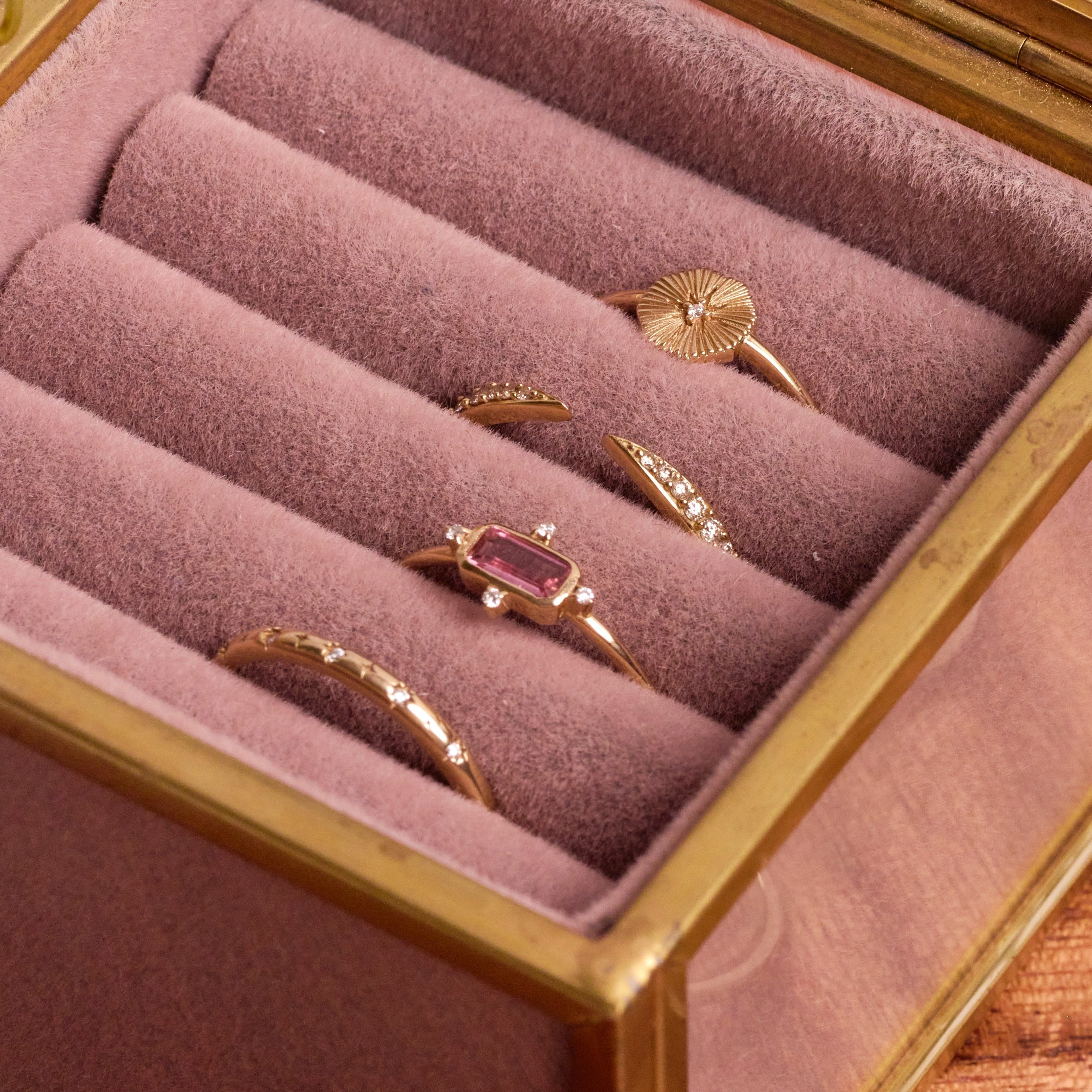 solid gold rings in pink jewellery box including the Pink Tourmaline & Diamond Ring 9k Gold 