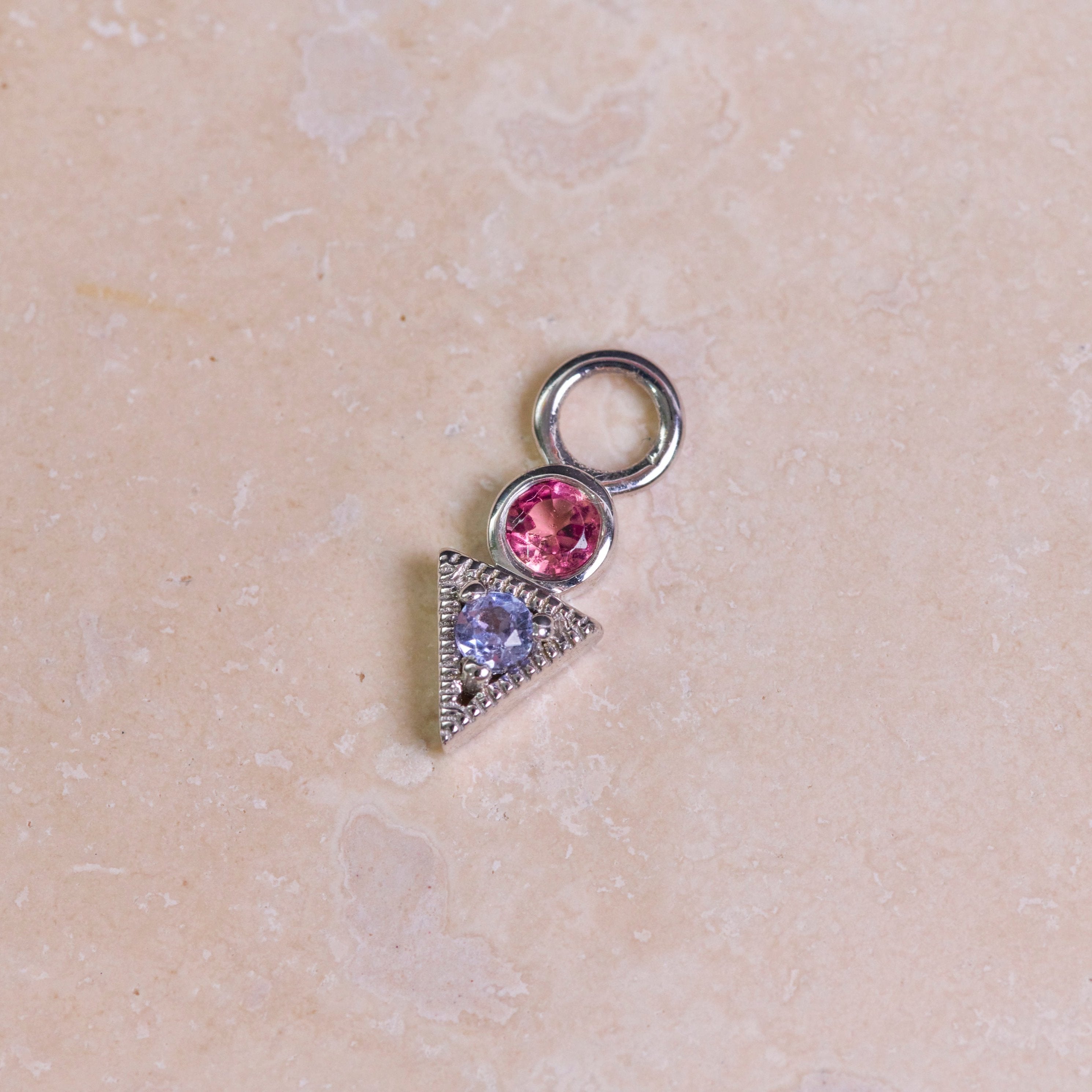 Pink Tourmaline & Tanzanite Geo Earring Charm Sterling Silver on hard surface