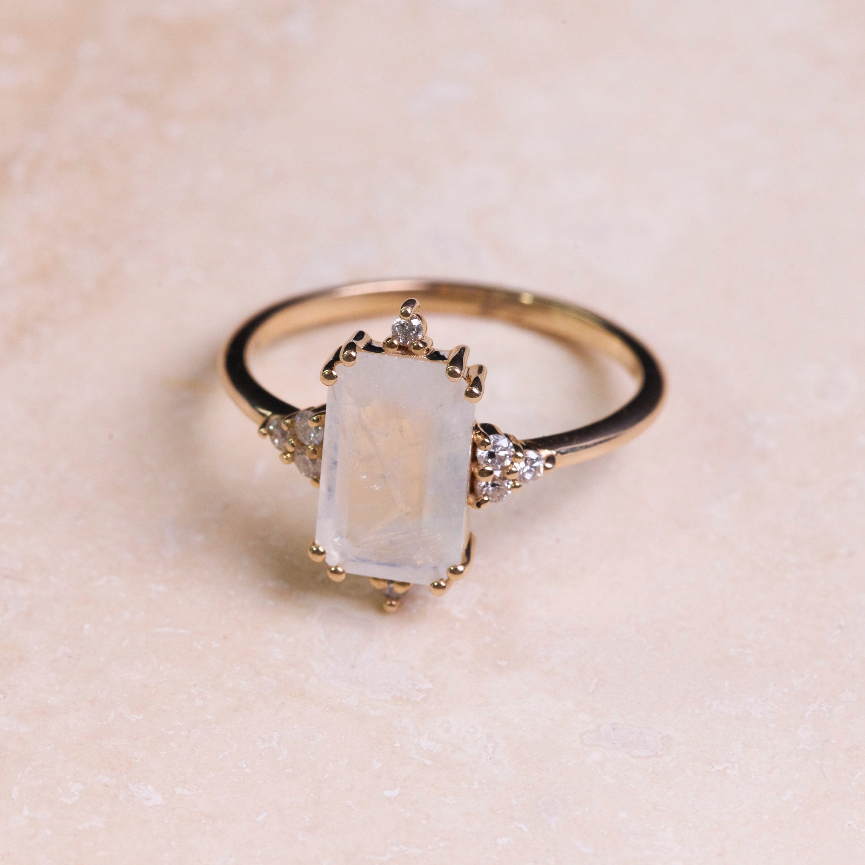 Rectangle Moonstone & Diamond Ring 9k Gold on hard surface