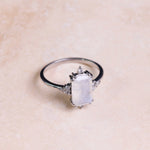 Rectangle Moonstone & White Sapphire Ring Sterling Silver on hard surface