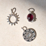 silver stone pendants on limestone
