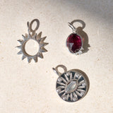 silver stone pendants on limestone