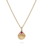 Ruby shell pendant gold white background