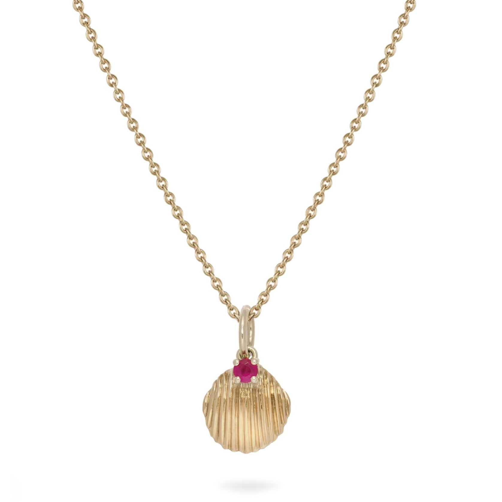 Ruby shell pendant gold white background