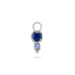 Silver earring charm with blue and purple gemstones on a white background