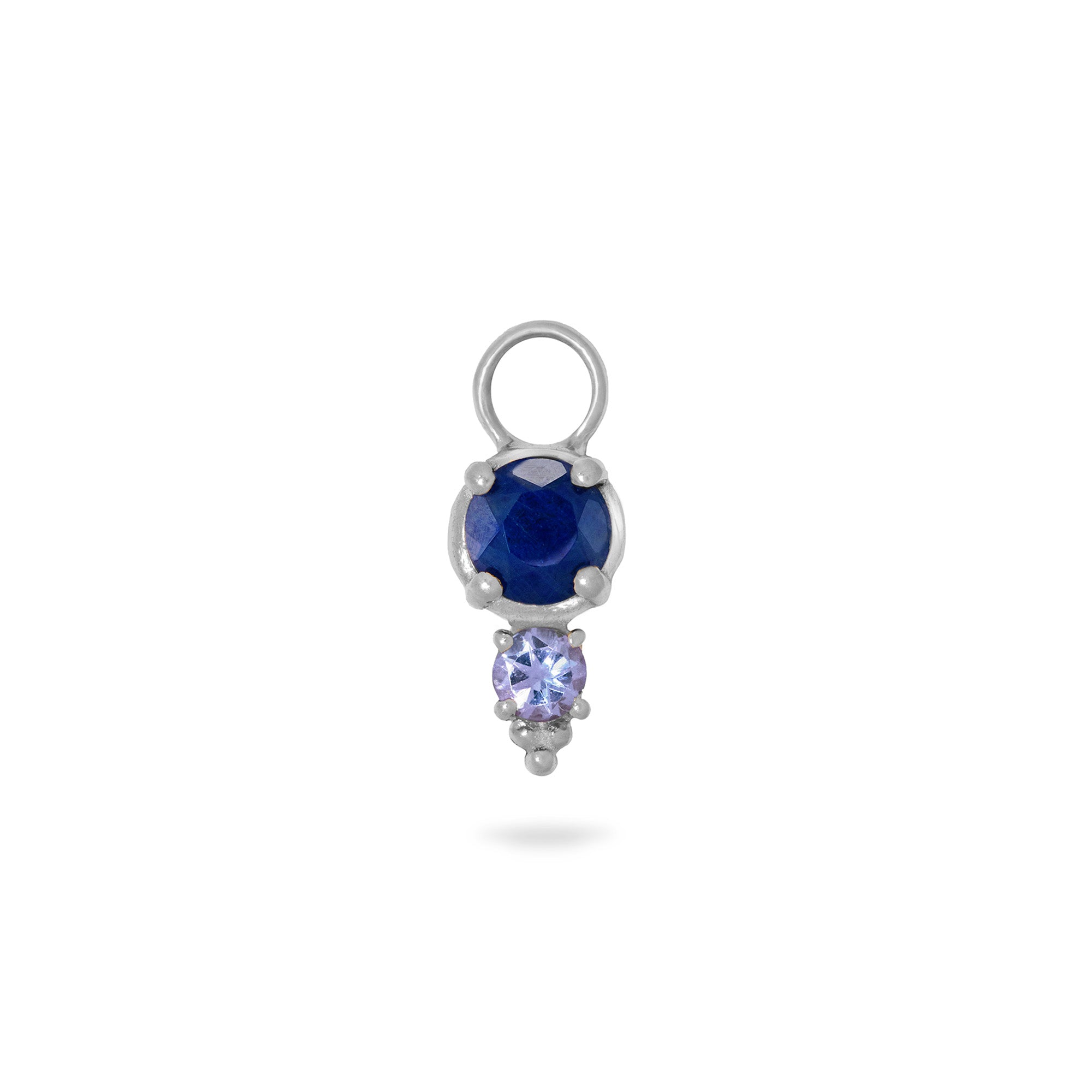 Silver earring charm with blue and purple gemstones on a white background