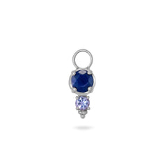 Silver earring charm with blue and purple gemstones on a white background